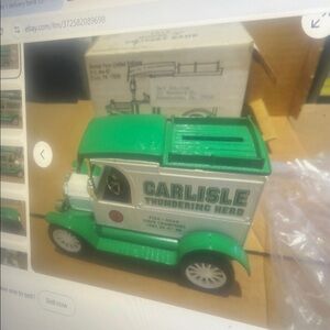 Vintage Green and White Carlisle Thundering Herd Model due  cast bank